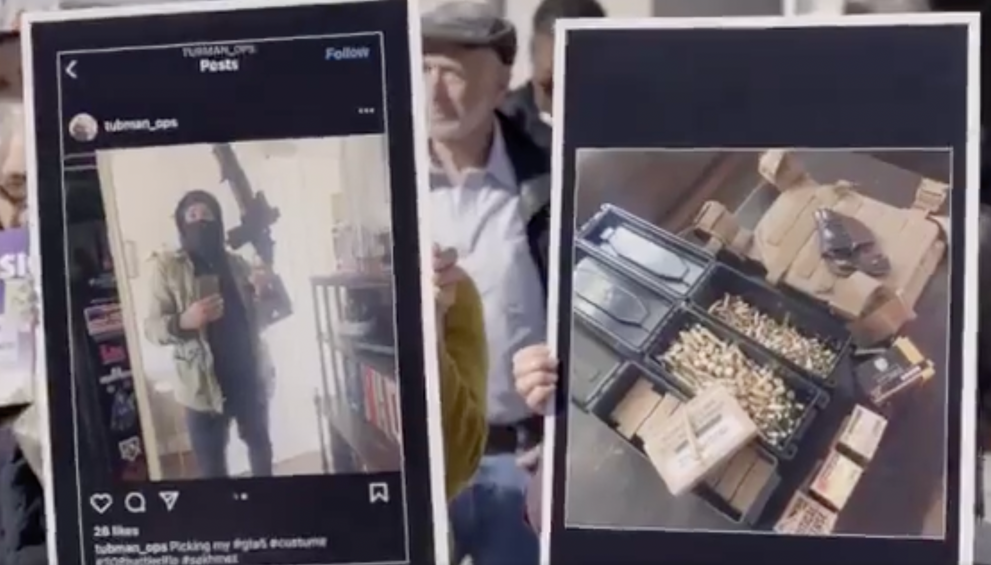 Oakland community leaders hold photos of Seneca Scott with guns. Screenshot of video.
