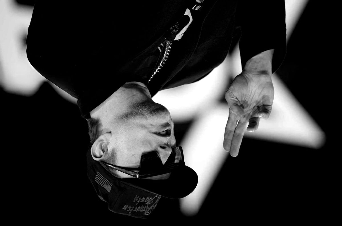 Upside down photo of Elon Musk in DOGE gear